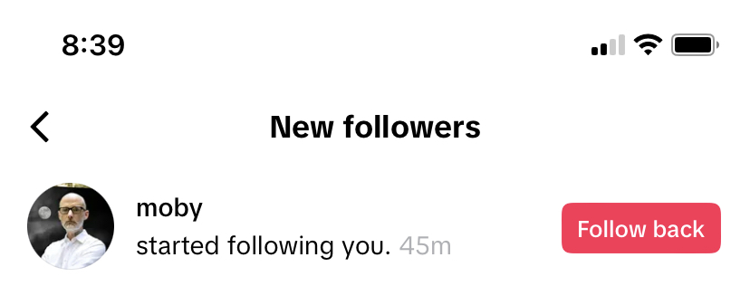 Screenshot of a TIkTok notification that reads 'Moby started following you'. 