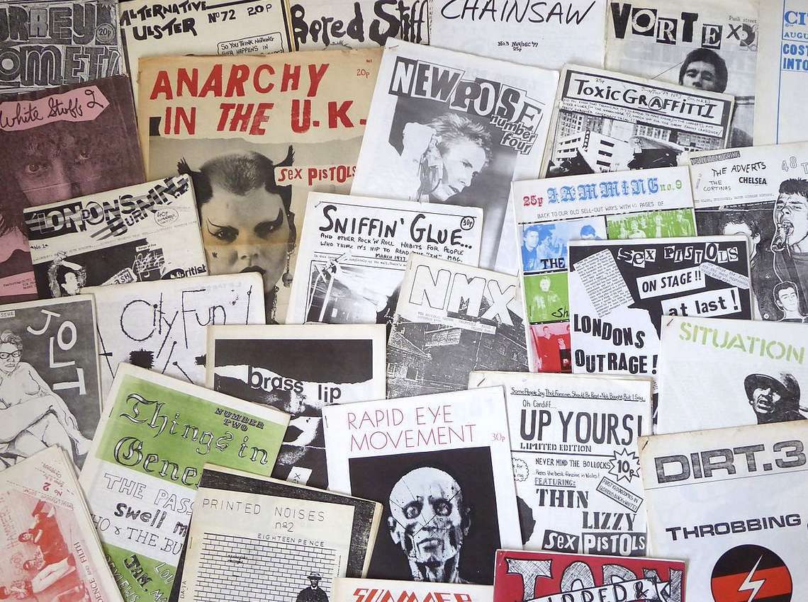 Punk zines layered on top of one another.